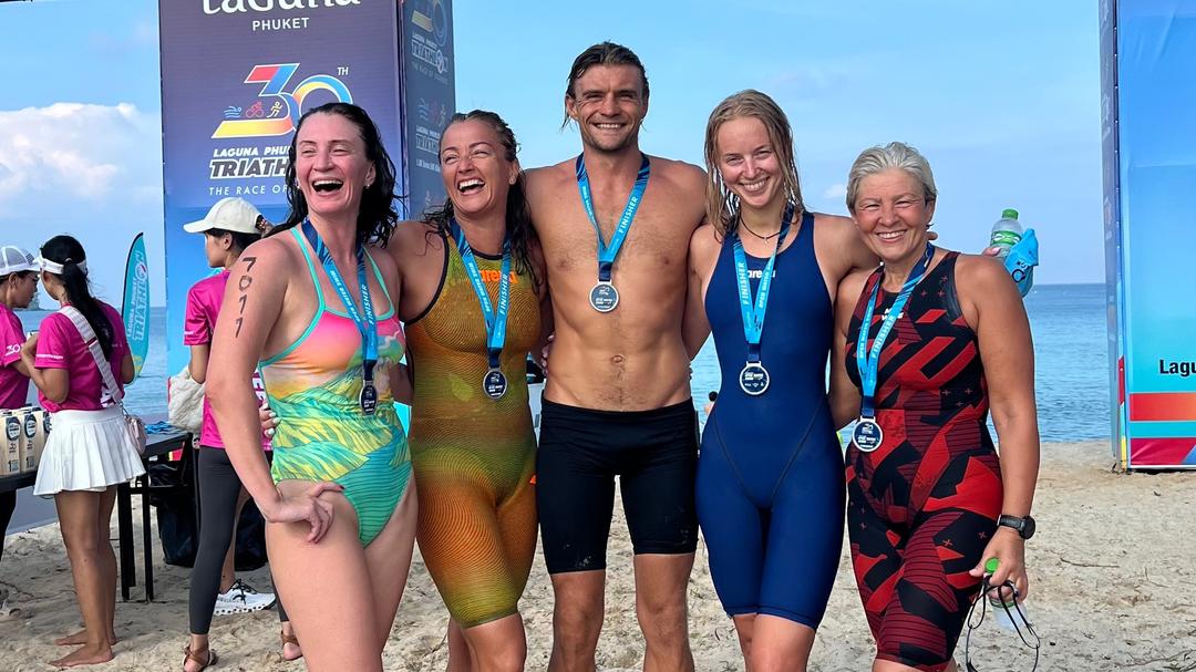 Participants celebrating a previous Phuket event with their medals